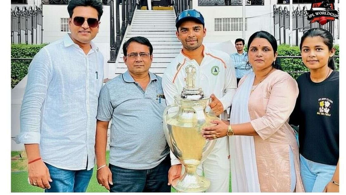 Danish Malewar hold Trophy with her Family